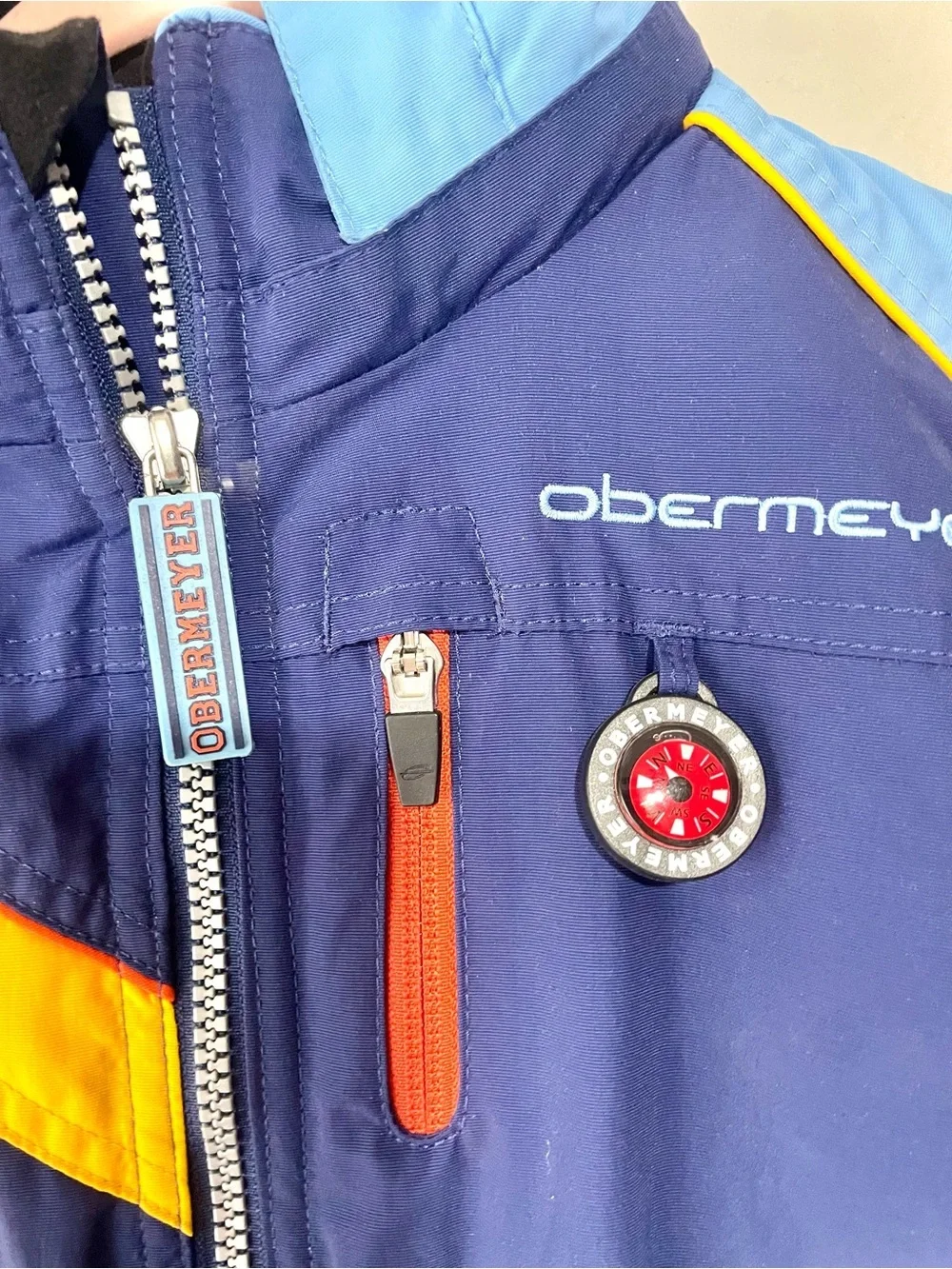 Obermeyer Navy, Light Blue & Yellow Kids One-Piece Ski Suit
